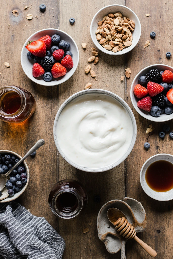 Greek yogurt parfait with fruit and nuts ingrediants